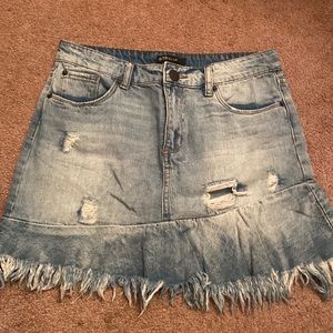 Distressed denim skirt